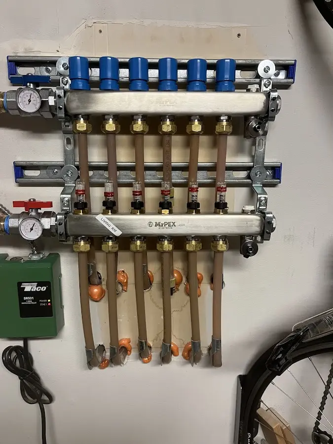 Plumber performing Leak Detection at a residential property in Hollis